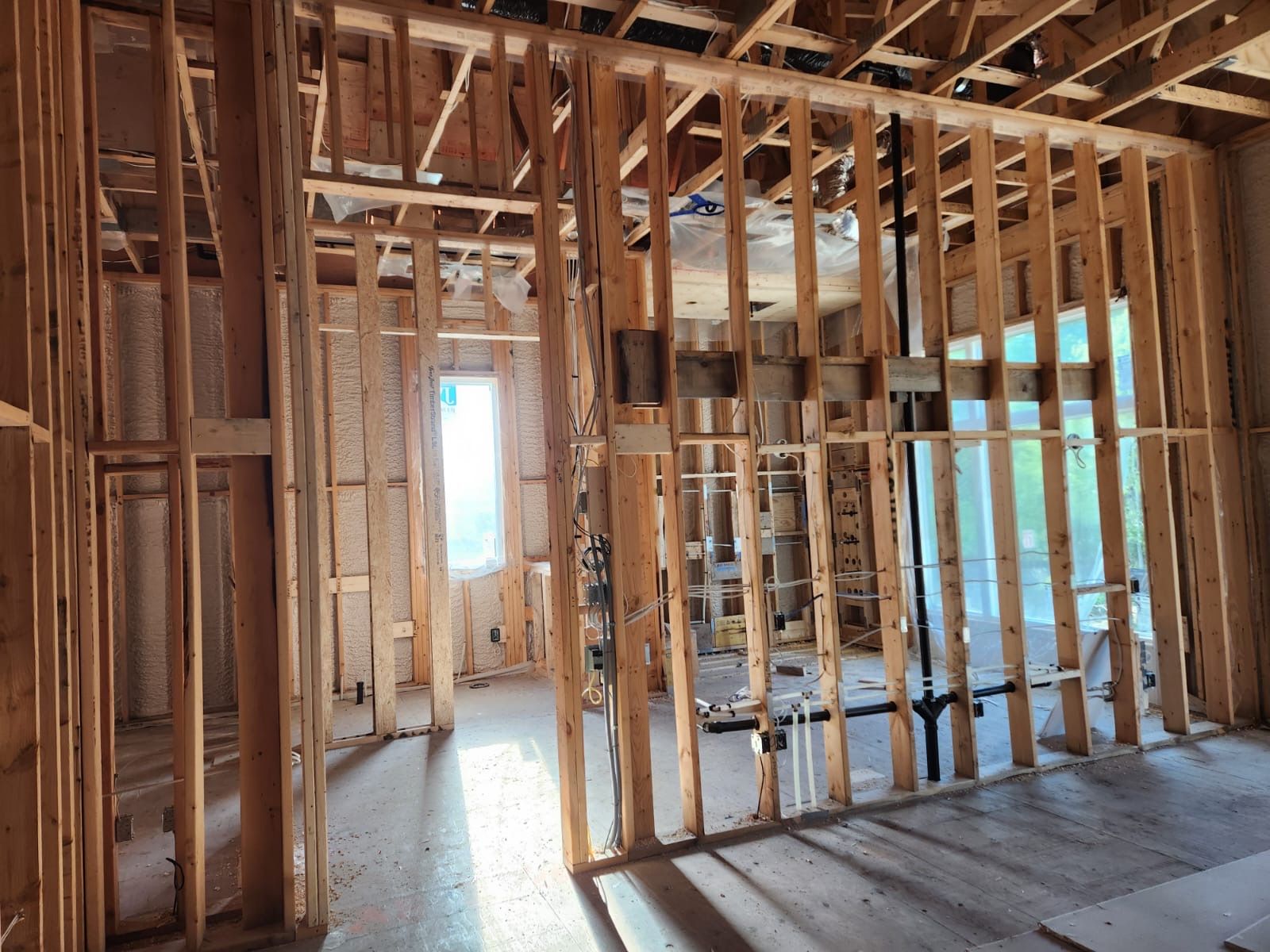 Open framing with exposed studs, joists and rough mechanical work